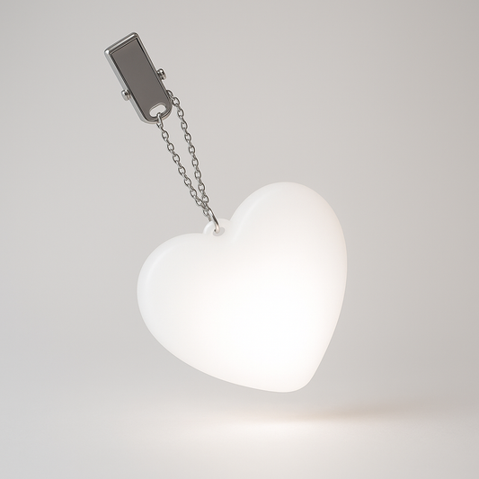 HeartGlow – Compact LED Accessory for Easy Bag Visibility